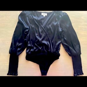 NWOT Peach Love California Surplus Bodysuit with Smocked Long Sleeves.